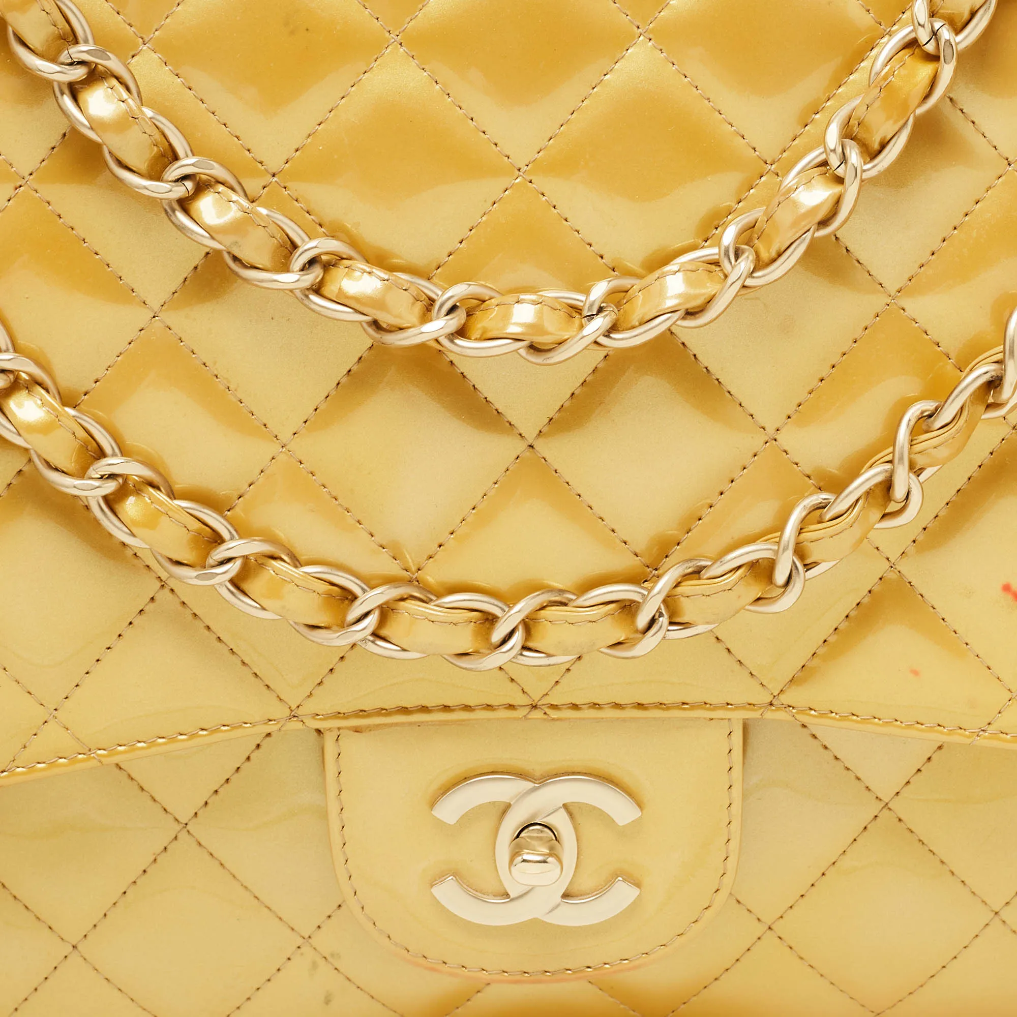 CHANEL Gold Quilted Patent Leather Maxi Classic Single Flap Bag